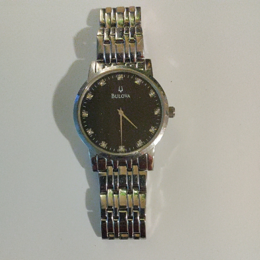 Bulova Silver and Black Elegant Dress Watch [BATTERY NOT INCLUDED ]